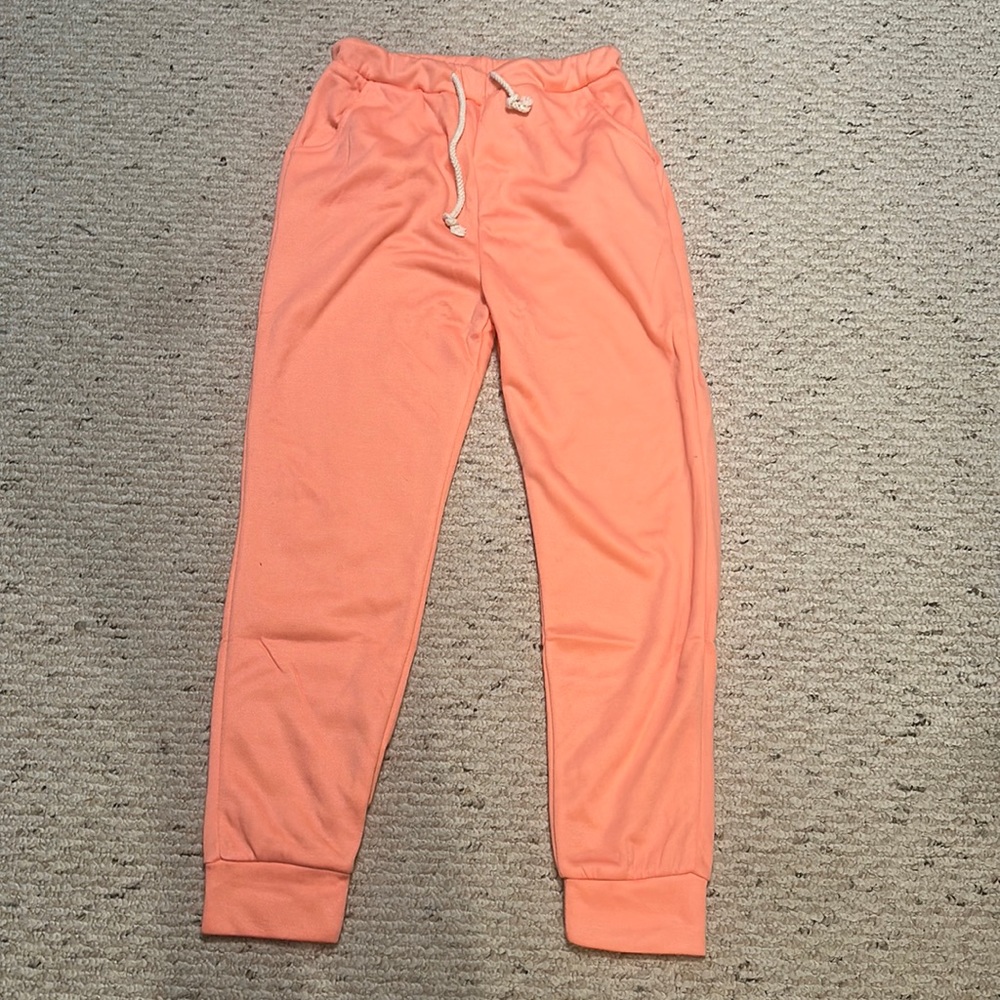 Unknown brand joggers. Warm, cozy, coral joggers that are size medium.